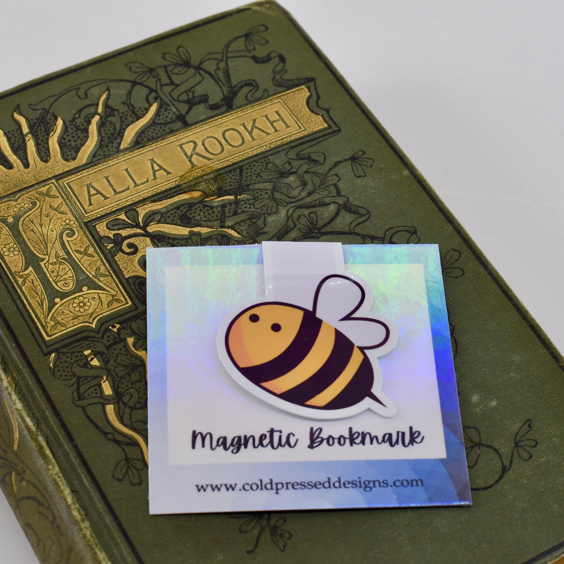 A handmade magnetic bookmark with a bumble bee design.