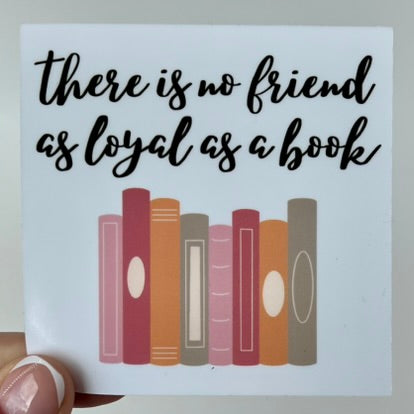 A white vinyl sticker with a design of stacked books and the text 'There is no friend as loyal as a book'.