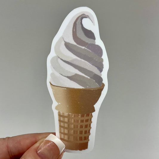 A vinyl sticker depicting a vanilla soft serve ice cream cone.